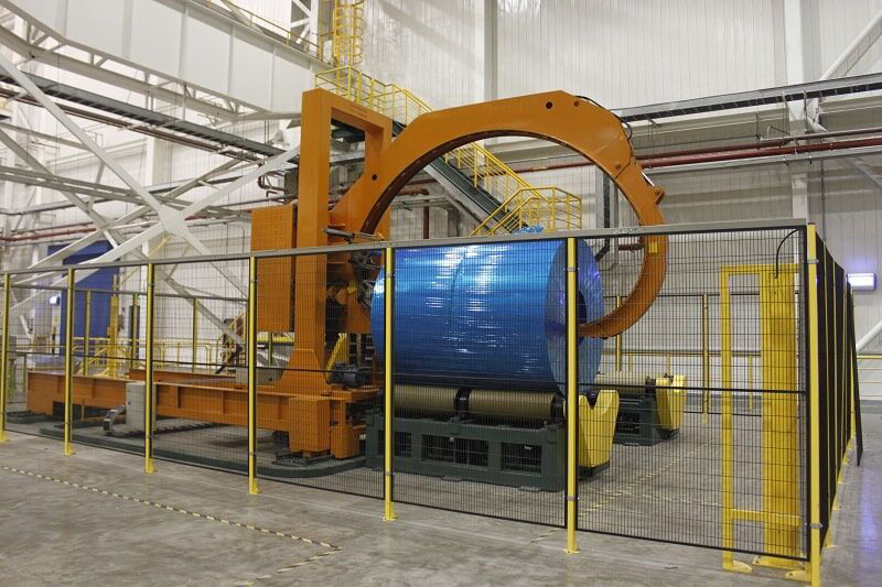 Vertical coil packing line