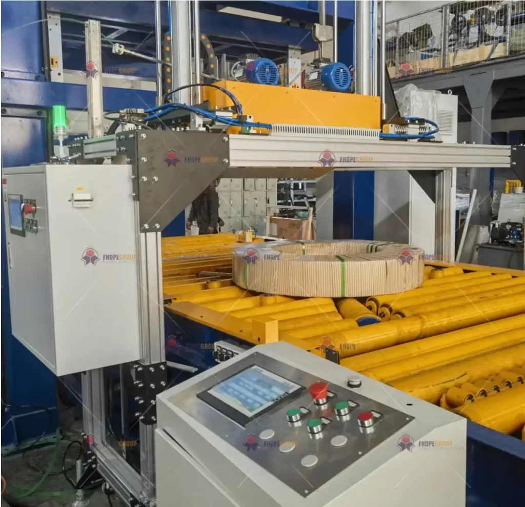 Automated Radial Strip Coil Strapping Machine BY PET